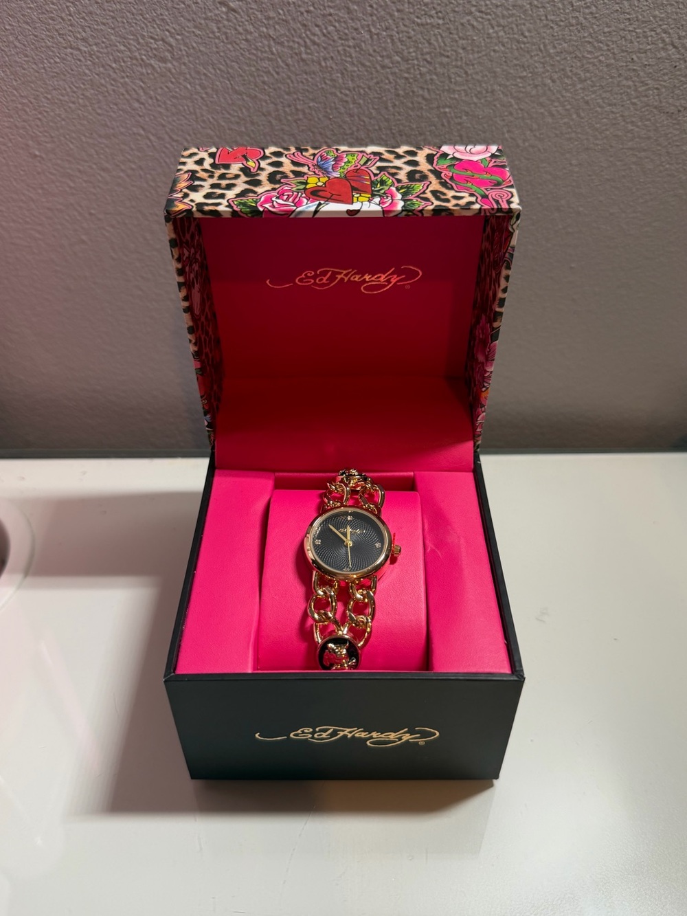 Ed Hardy watch with tiger design pendants